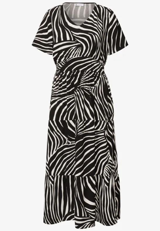 Midi-jurk met korte mouwen, ronde hals en opvallende zwart-witte zebraprint.