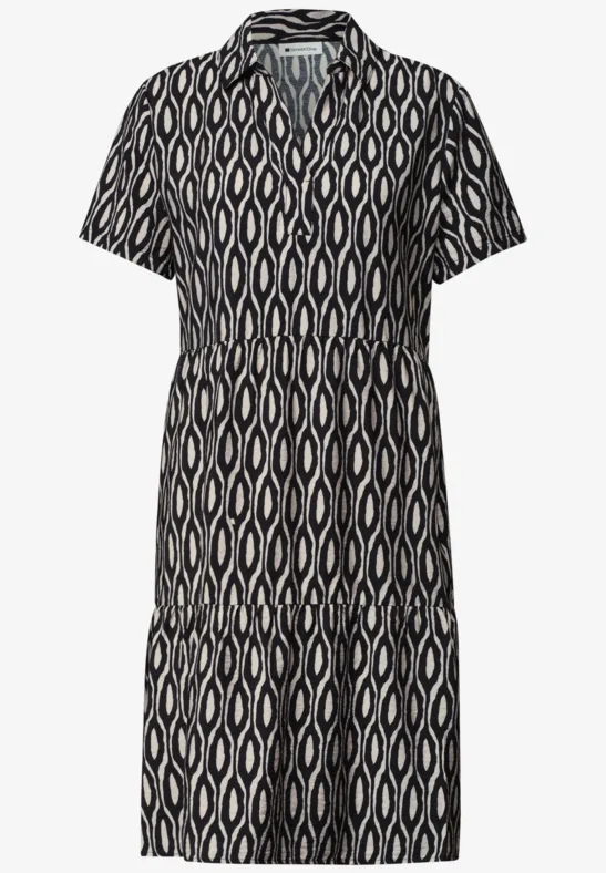 Robe-chemise à col, manches courtes, imprimé noir et blanc géométrique, jupe à volants.