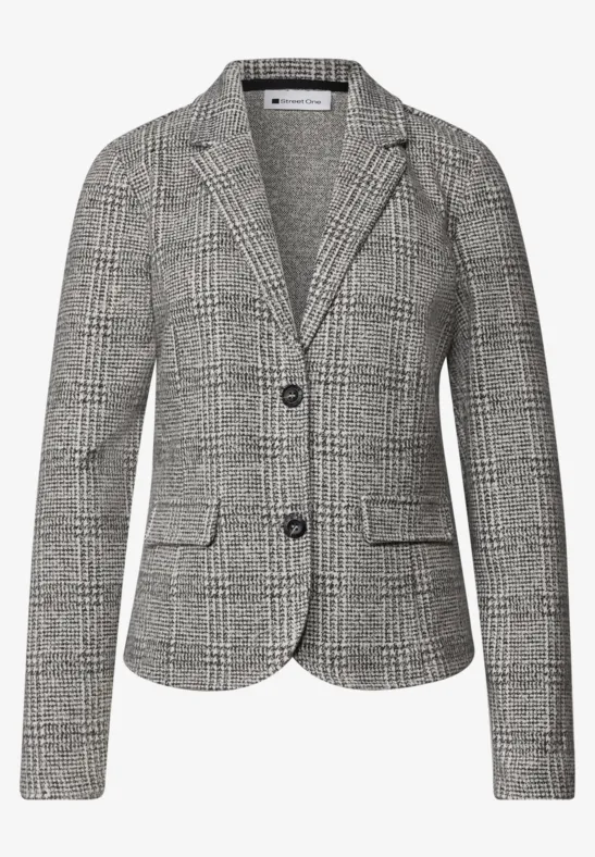 Veste femme cintrée à deux boutons, motif pied-de-poule noir et blanc.