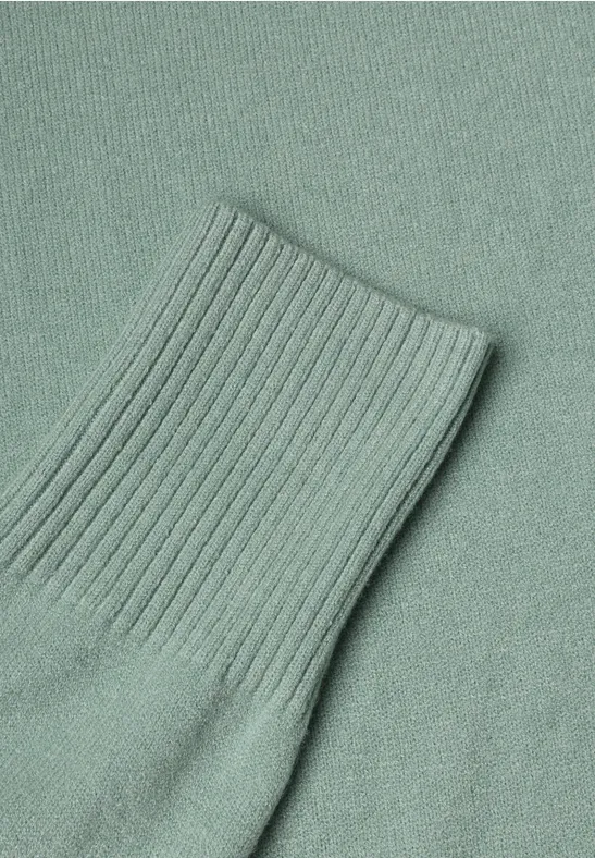 Pull en maille vert menthe avec bord-côte côtelé.