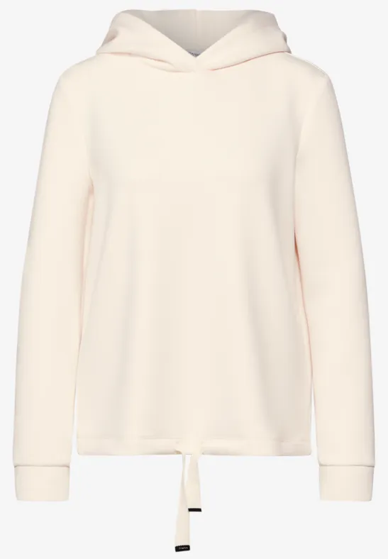 Beiger Kapuzenpullover mit Schnürung am Saum.