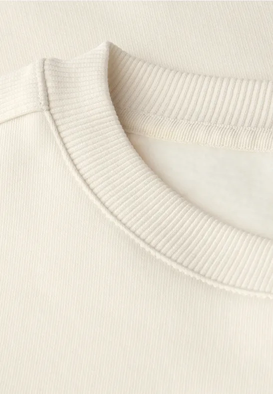 Sweater met geribd detail soft beige