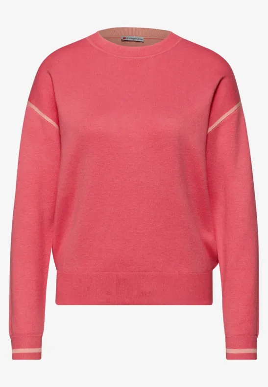 Pull avec détails contrastés striking coral