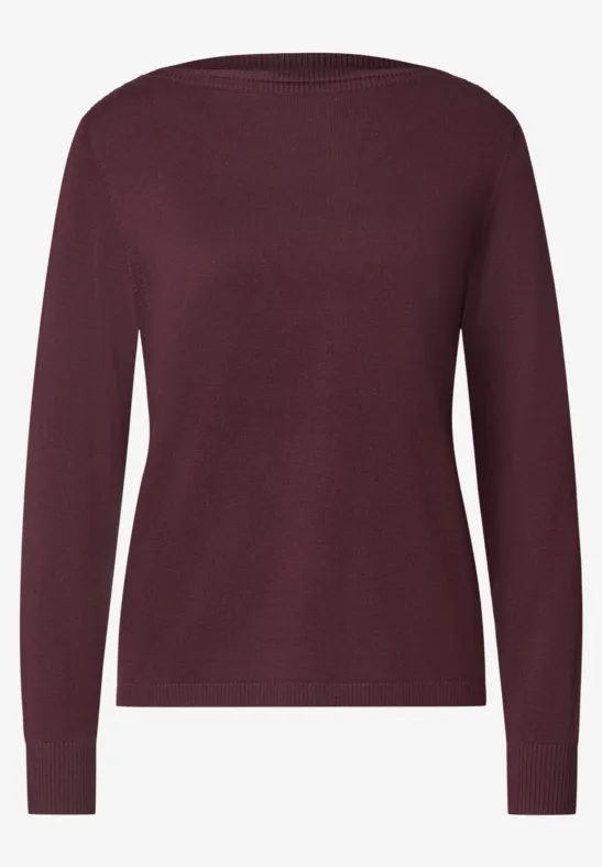 Pull à manches longues pour femme de couleur bordeaux.