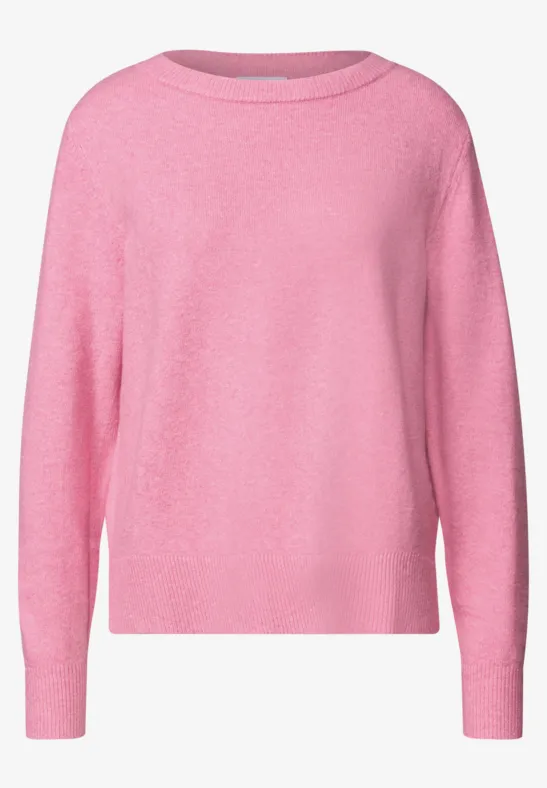Un pull rose à col rond avec des manches longues.