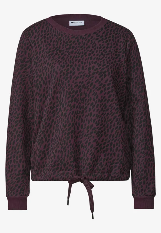 Pull décontracté à manches longues violet foncé avec imprimé léopard noir et lien de serrage à la taille.