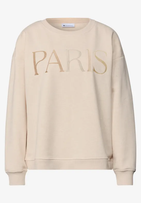 Sweatshirt beige avec l'inscription 'PARIS'