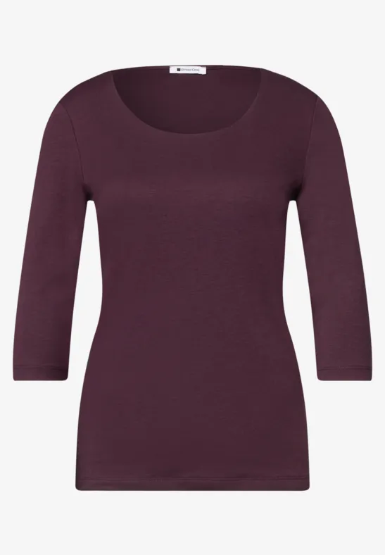 Violettes Damen-Shirt mit U-Boot-Ausschnitt und 3/4-Ärmeln.
