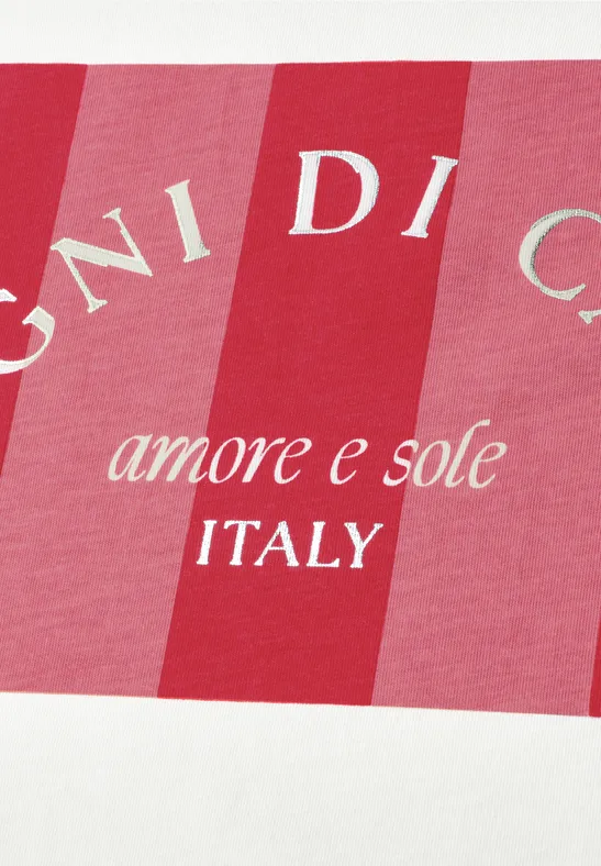 Rosa-rot gestreiftes Etikett mit dem Schriftzug 'amore e sole ITALY'.