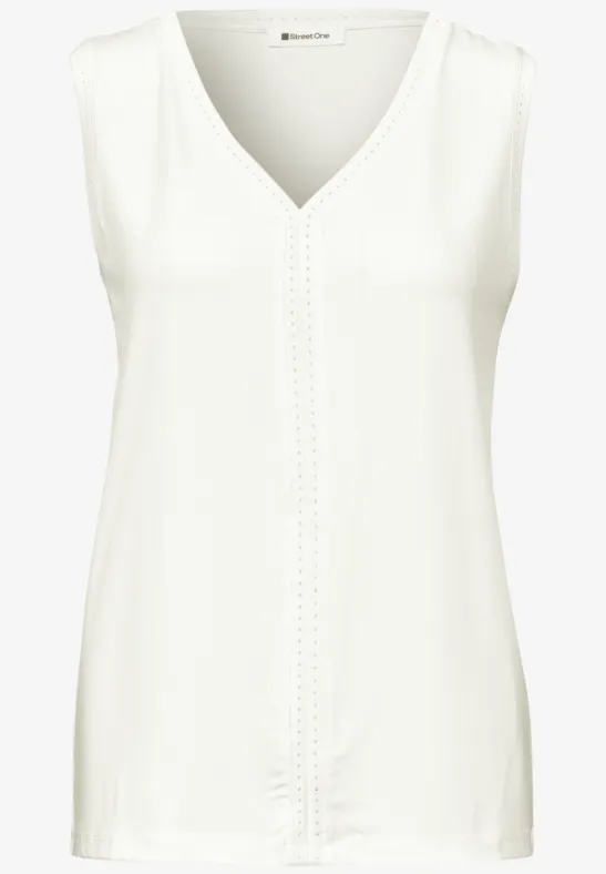 Top blanc sans manches à encolure en V avec coutures décoratives