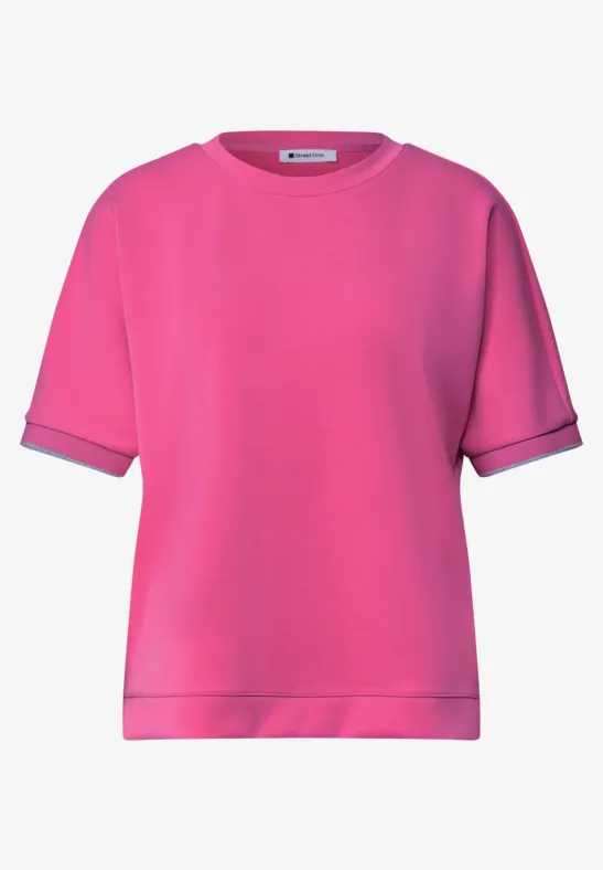 Felroze korte mouw sweatshirt met ronde hals.