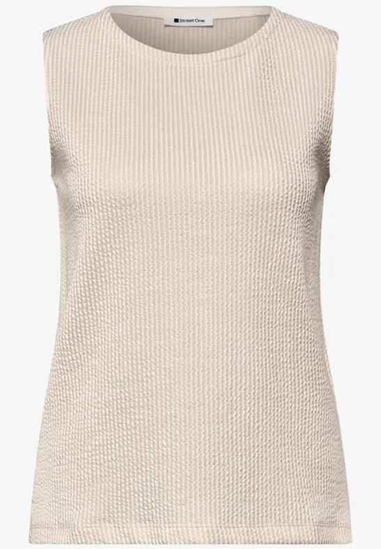 Ärmelloses beige Top mit feiner, strukturierter Strickoptik.