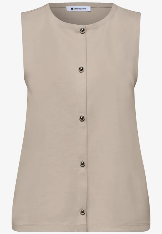 Haut sans manches beige avec boutons et encolure ronde.