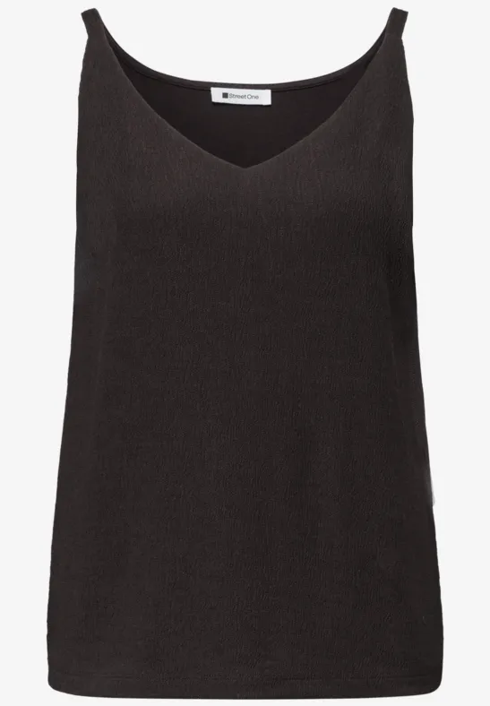 Zwart dames-topje zonder mouwen met V-hals en smalle bandjes.