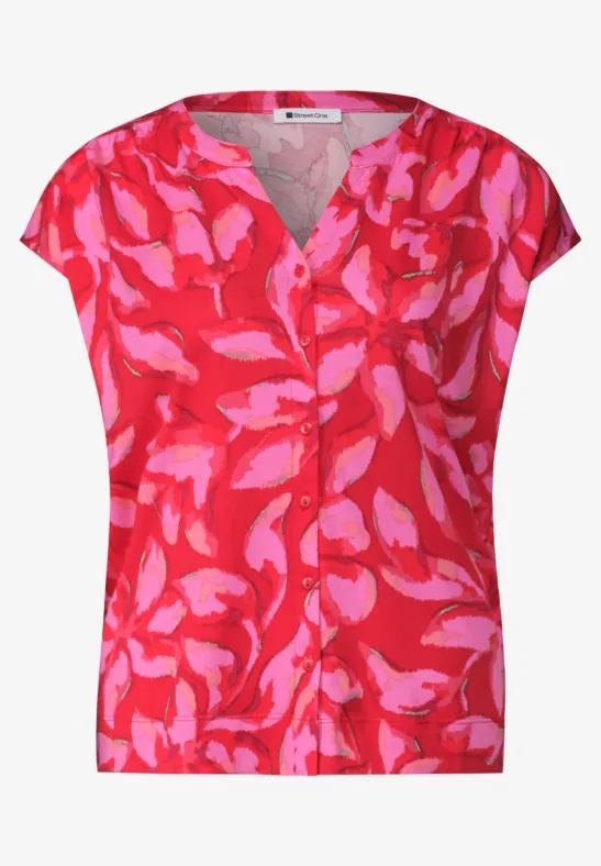 Rode damesblouse met roze, abstract bloemenprint, V-hals, korte mouwen, zomerse stijl.