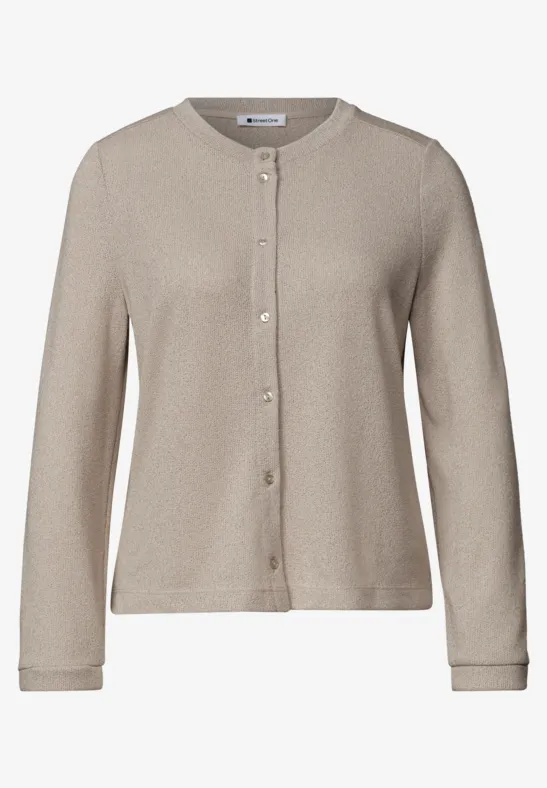 Beige gebreid vest met ronde hals en knoopsluiting, eenvoudig en elegant.