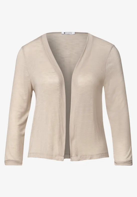 Cardigan femme beige ouvert à manches 3/4 en maille légère et fine.