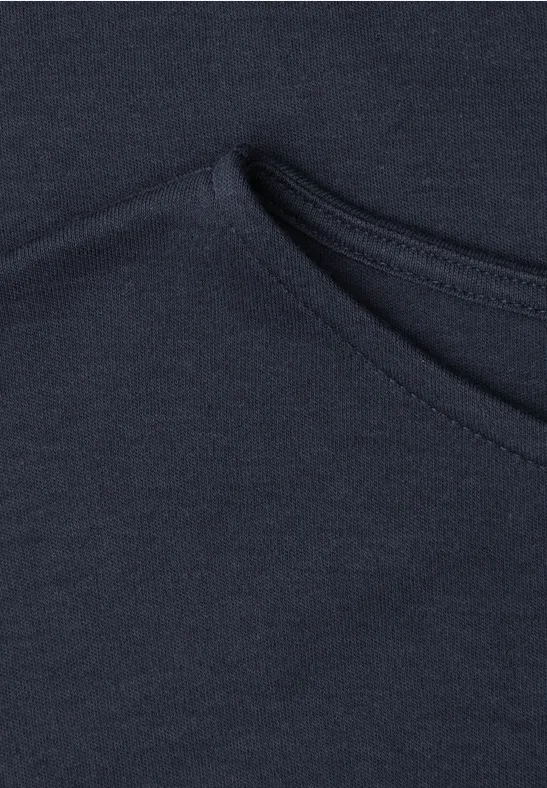 Tissu bleu foncé avec poche arrondie