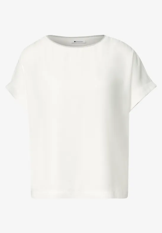Schlichtes weißes T-Shirt mit kurzen Ärmeln, weitem Schnitt und rundem Halsausschnitt.