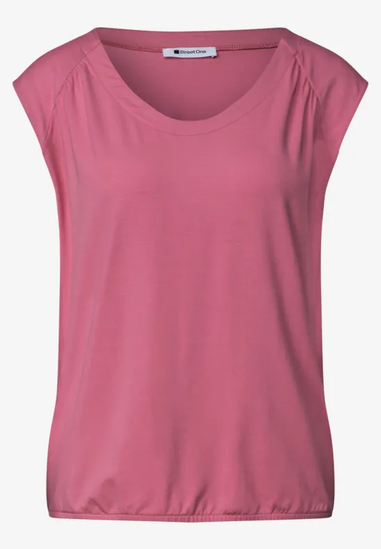 Top rose femme avec encolure ronde large et épaules tombantes.