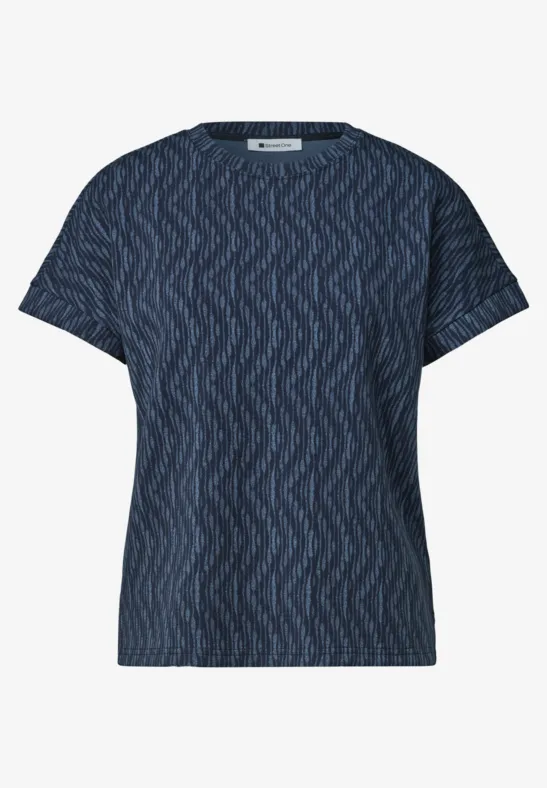 T-shirt bleu marine à manches courtes avec motif en zigzag discret.