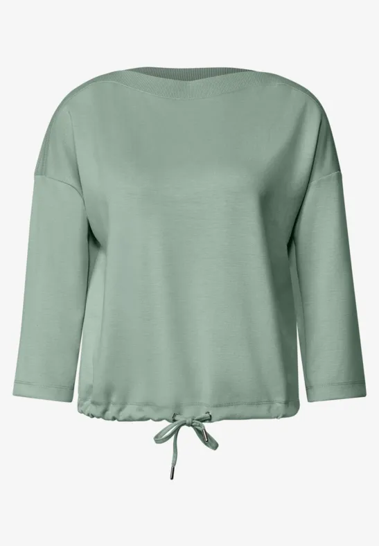 Groene blouse met driekwartmouwen en aantrekkoord onderaan