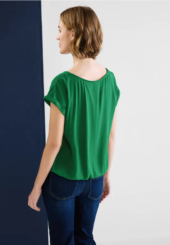 Bluse mit Elastiksaum brisk green