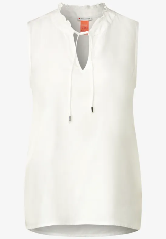 Ärmellose Bluse mit Rüschen off white