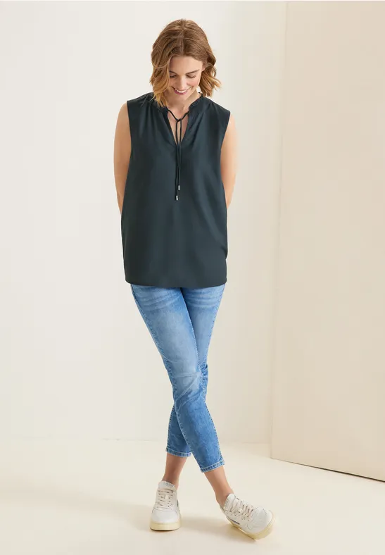 Ärmellose Bluse mit Rüschen cool vintage green