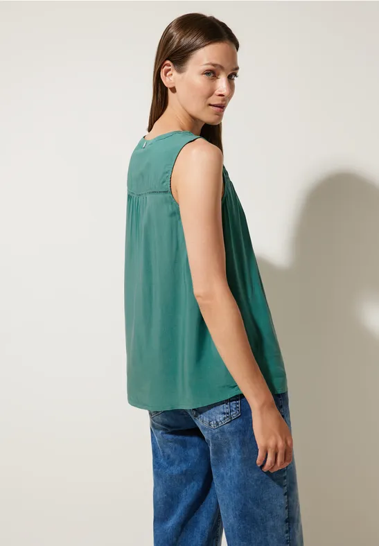 Viskosebluse mit Häkeldetail lagoon green