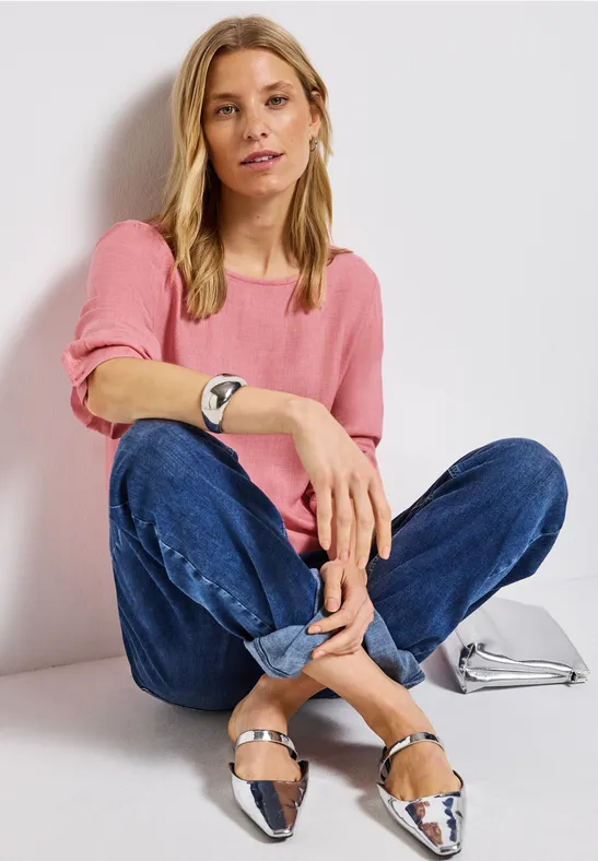 Gemêleerde blouse met ronde hals almond coral mel.