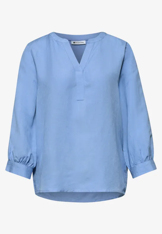 Lichtblouse voor dames met lange mouwen en V-hals