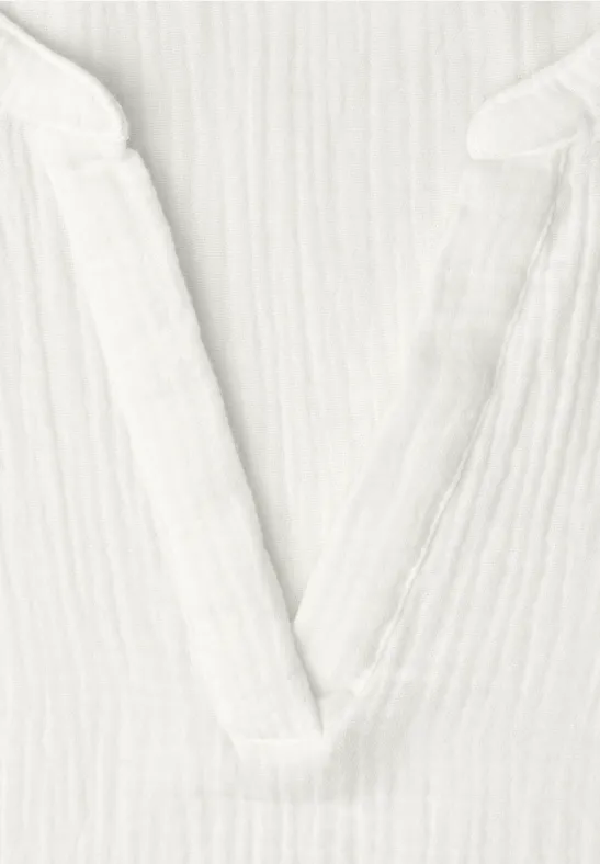Blouse met korte mouwen in mousseline kwaliteit off white