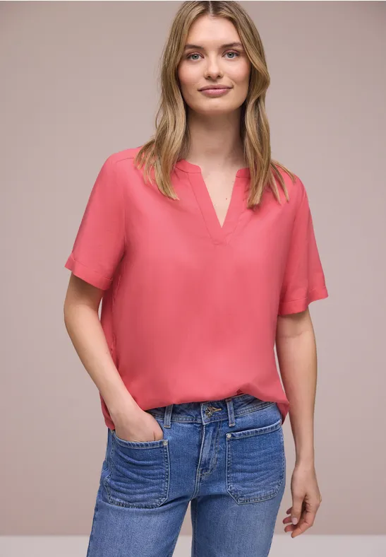 Blouse met gespleten hals en omslag striking coral