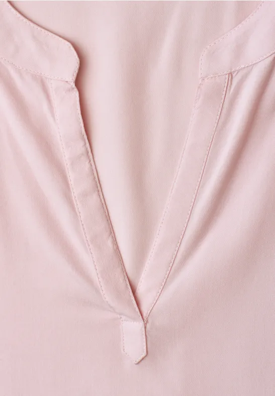 Lichtroze blouse met V-hals en klein split