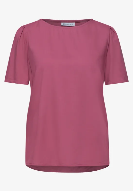 Eenvoudig roze dames T-shirt met korte mouwen en ronde hals.