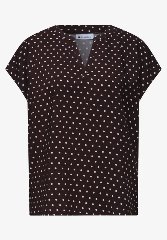 Schwarzes Damen-Shirt mit V-Ausschnitt und weißen Punkten.