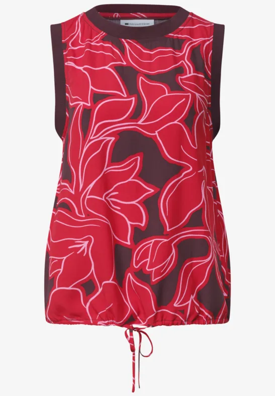 Rood mouwloos topje met abstracte bloemenprint en koordsluiting onderaan.