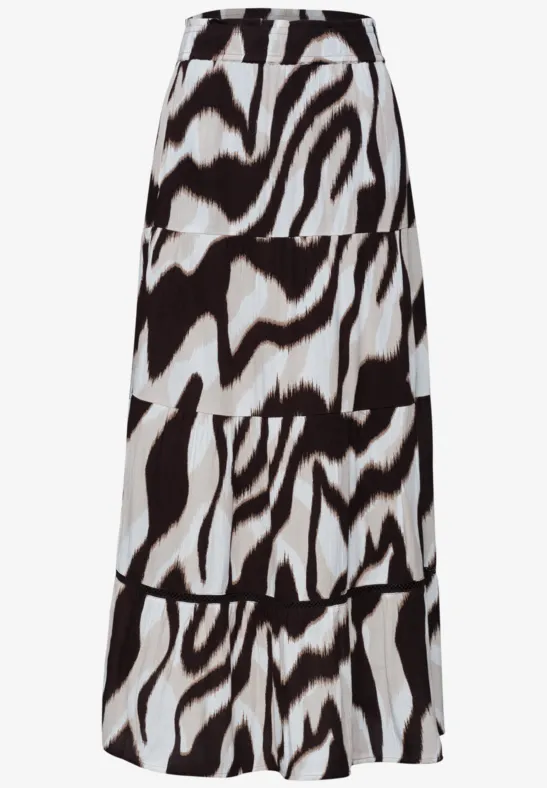 Lange rok met zwart-witte dierenprint, hoge taille en vloeiende pasvorm