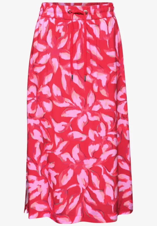 Langer roter Rock mit pinkem Blattmuster, elastischem Bund und Bindegürtel.