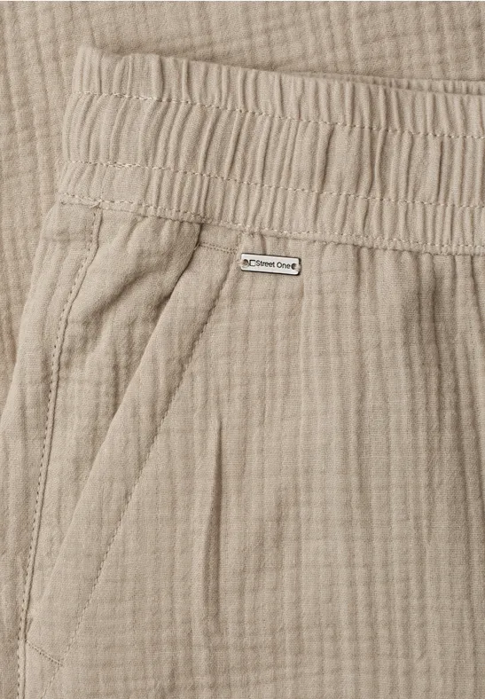 Beige, gestructureerde broek met elastische taille en zijzak