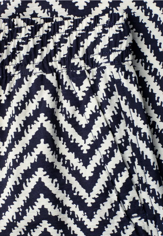 Zwart-witte zigzagpatroon op stof.