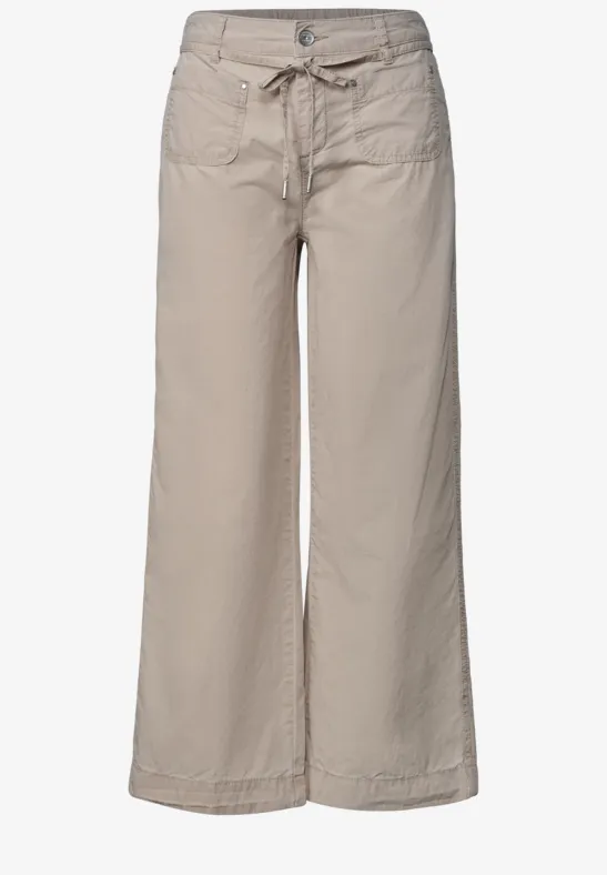 Beige wijde broek met trekkoord in de taille en brede pijpen van lichtgewicht stof