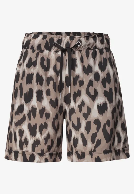 Short court femme à imprimé léopard, taille élastique avec cordon.