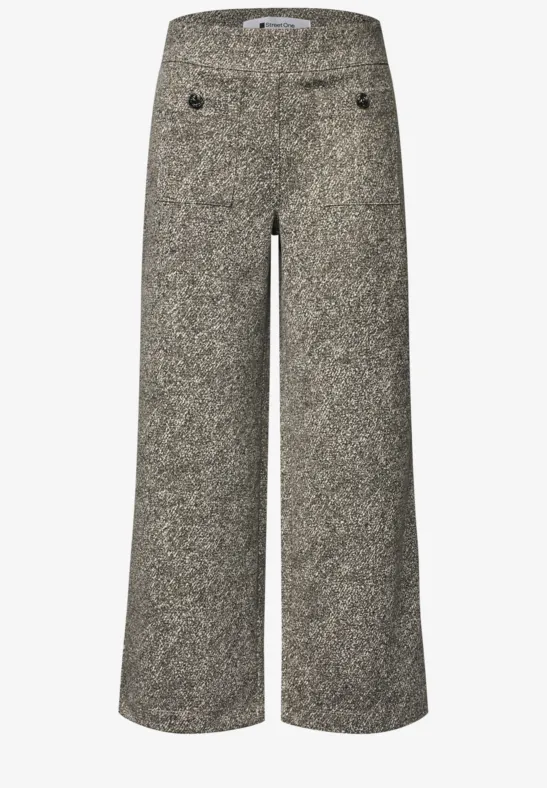 Pantalon gris en tweed à coupe large avec boutons décoratifs sur le devant.