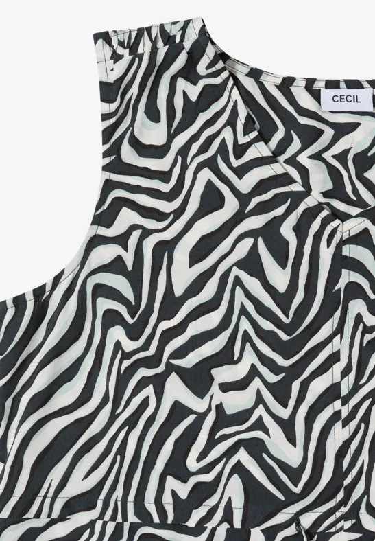 Haut sans manches à motif zèbre noir et blanc, style décontracté.