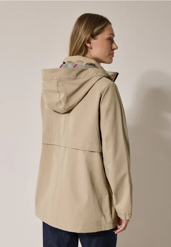 Korte trenchcoat creamy almond beige