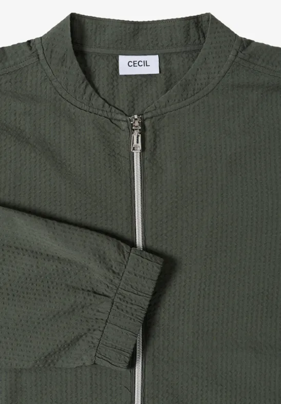 Kaki bomberjack met rits en CECIL-label.