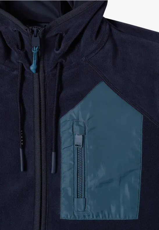 Dunkelblaue Jacke mit Reißverschluss und asymmetrischer Brusttasche