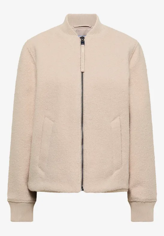 Cremefarbene Teddy-Fleece-Bomberjacke mit Reißverschluss und Stehkragen.